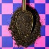 Ground dried lime loomi texture close up – tangy Middle Eastern spice